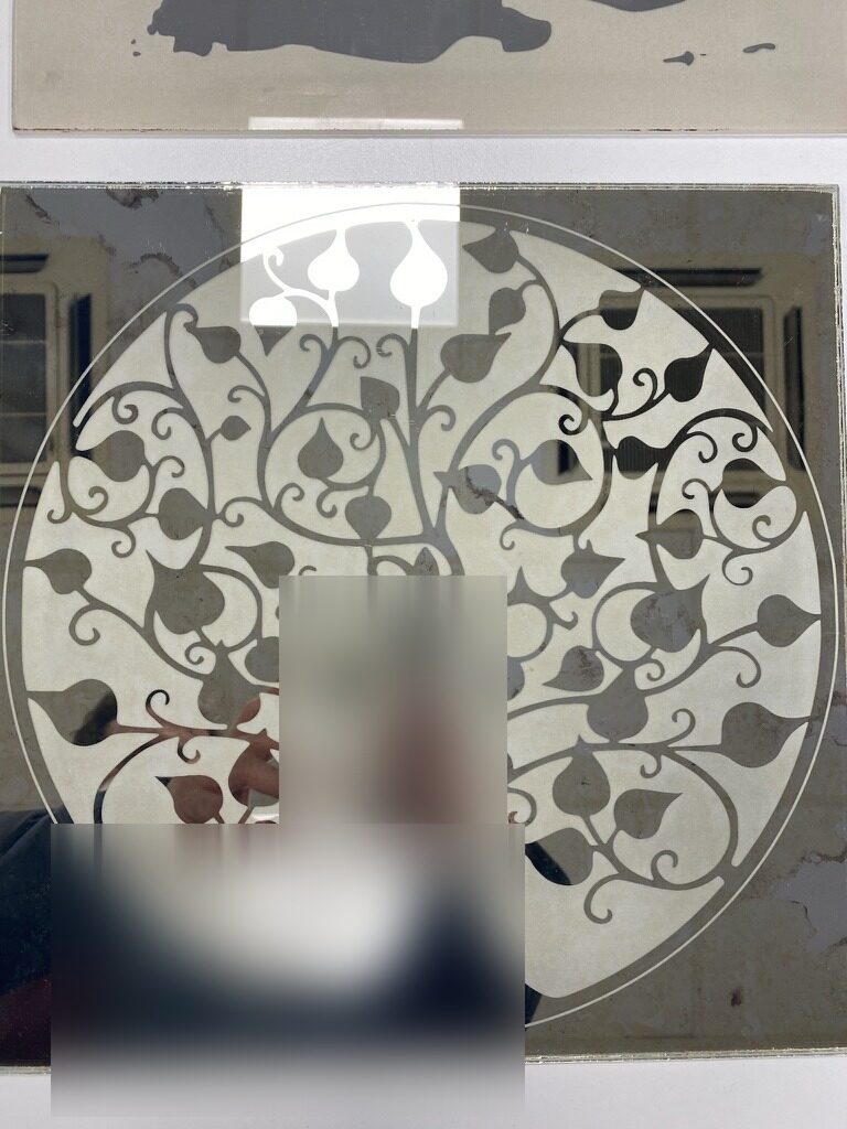 Tree of life engraved on mirror