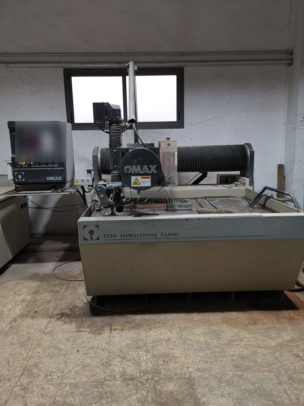Waterjet cutting center