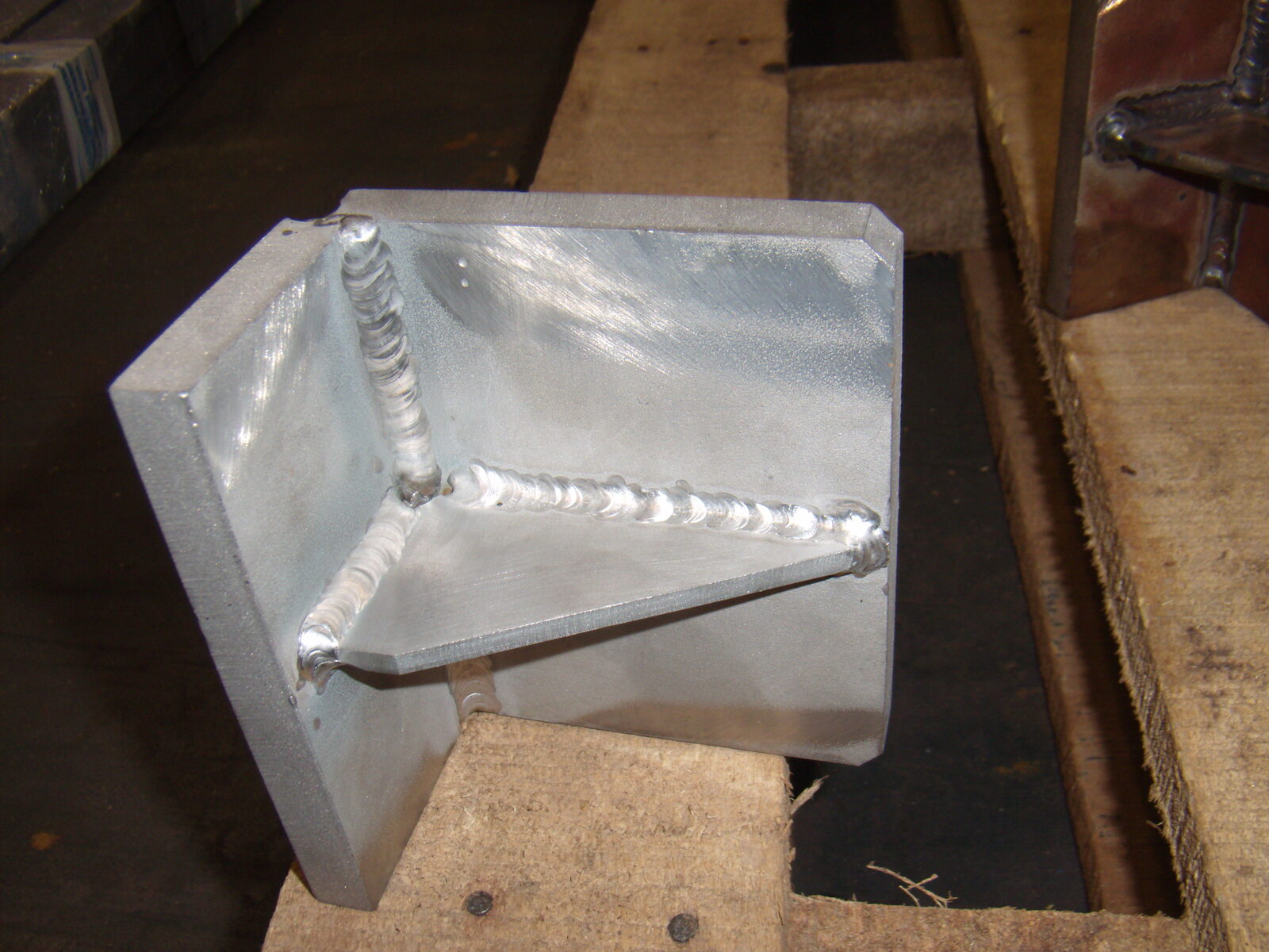 Welded angle bracket in workshop