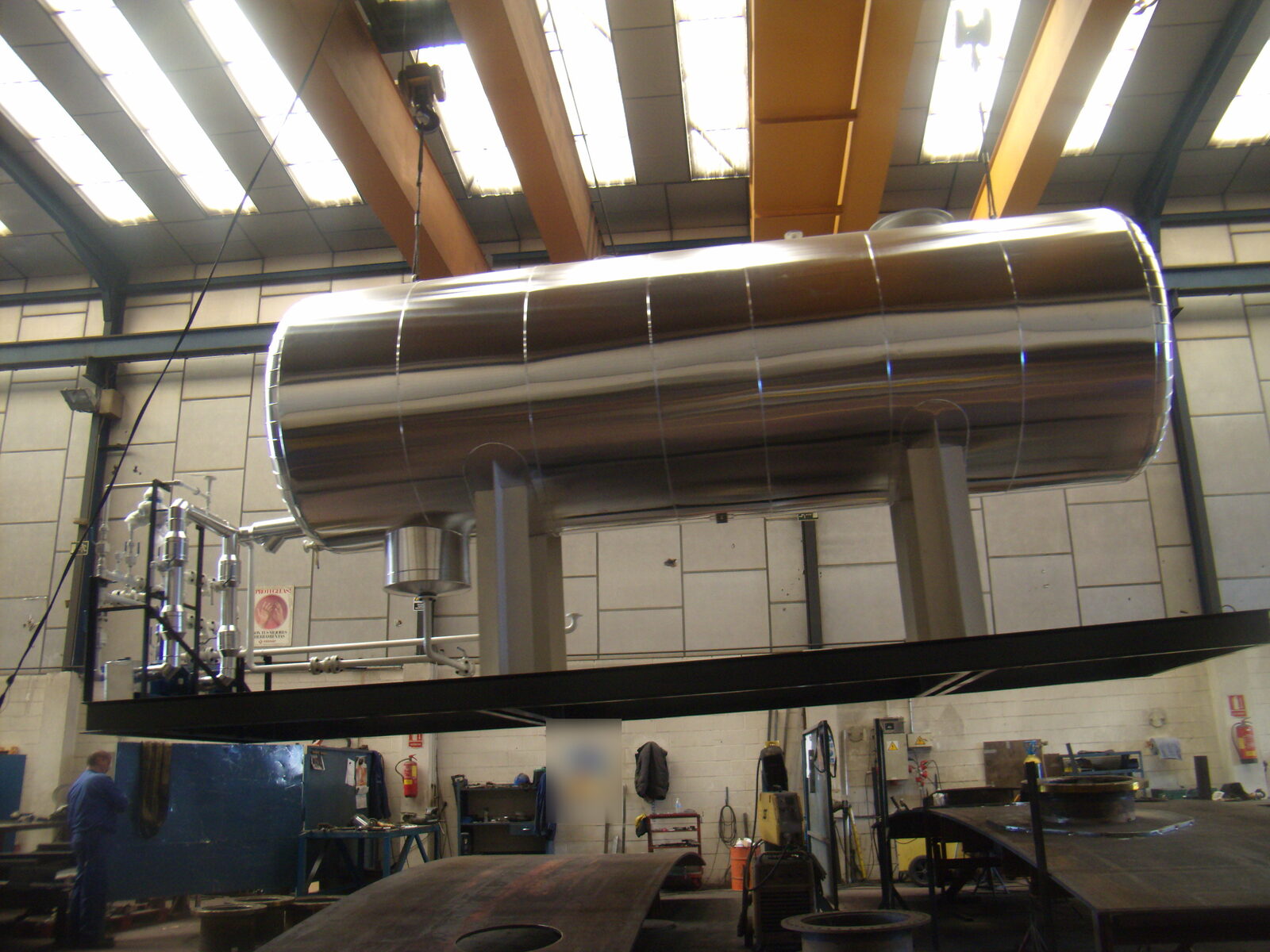 Insulated tank being lifted