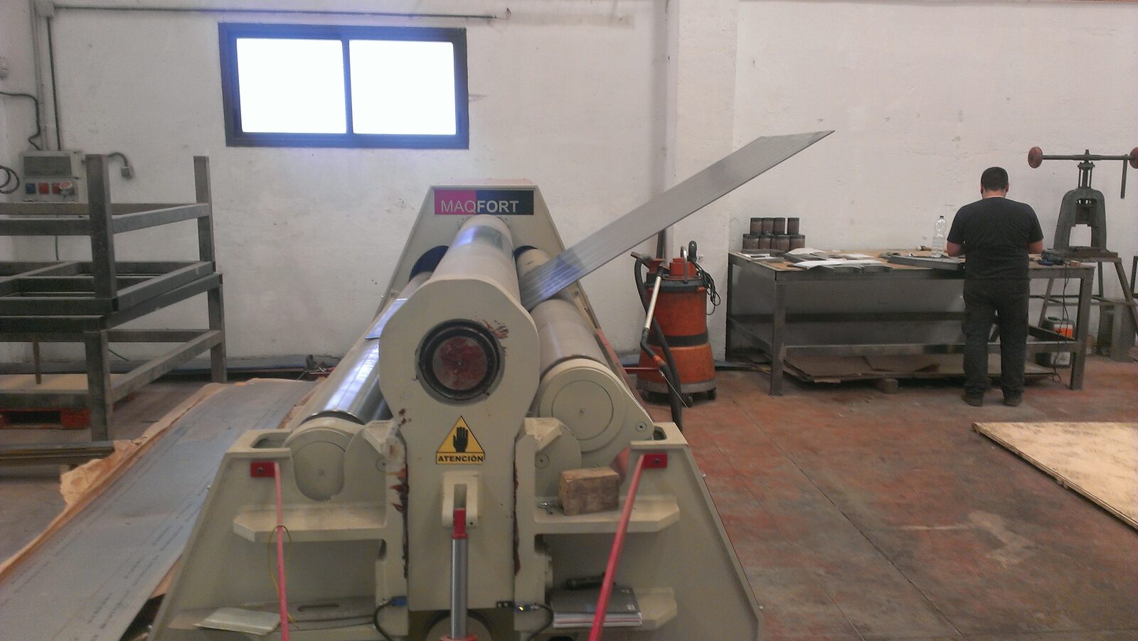 Roll bending machine at work