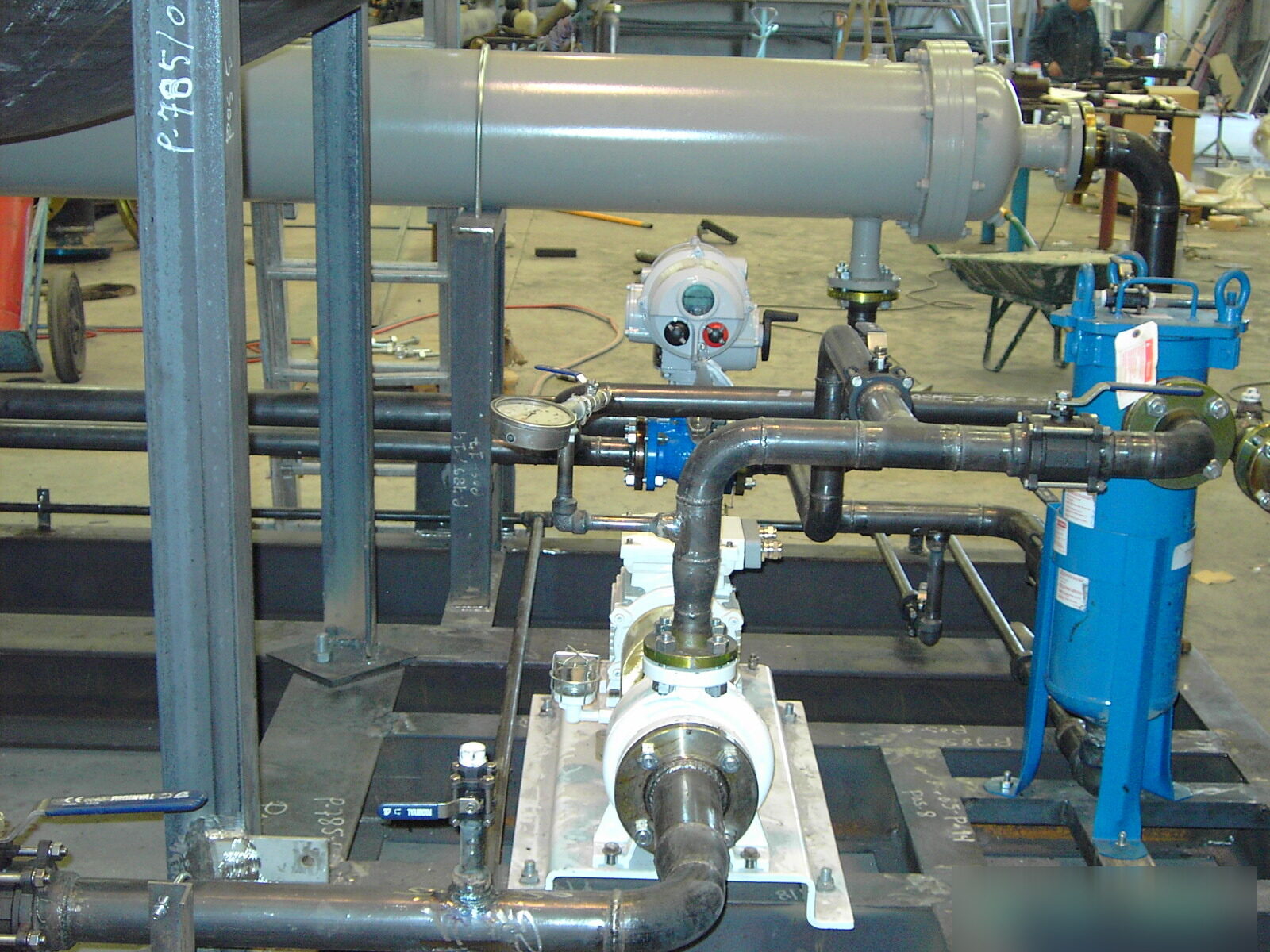 Pumping skid with heat exchanger