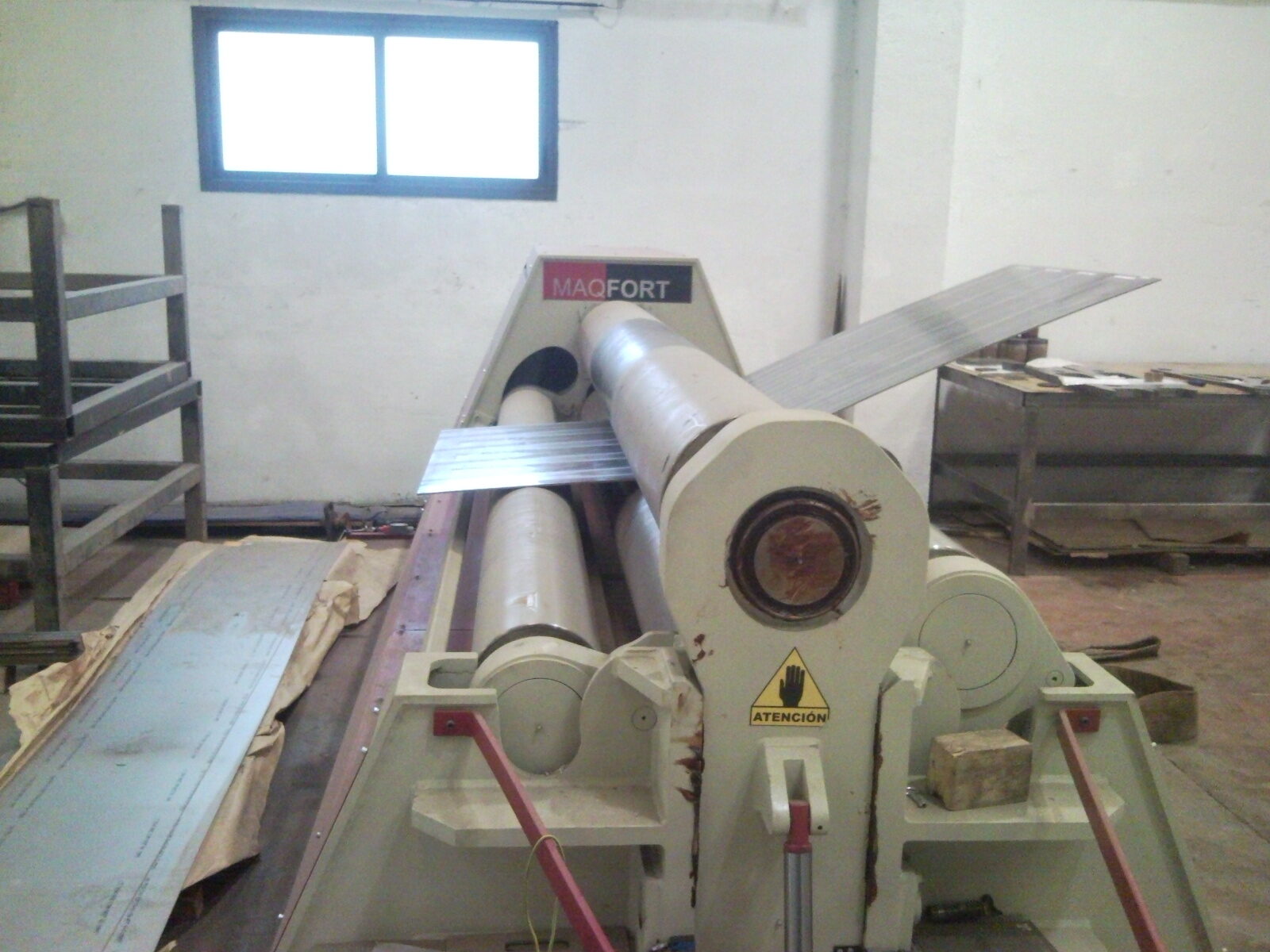 Roll bending sheet metal