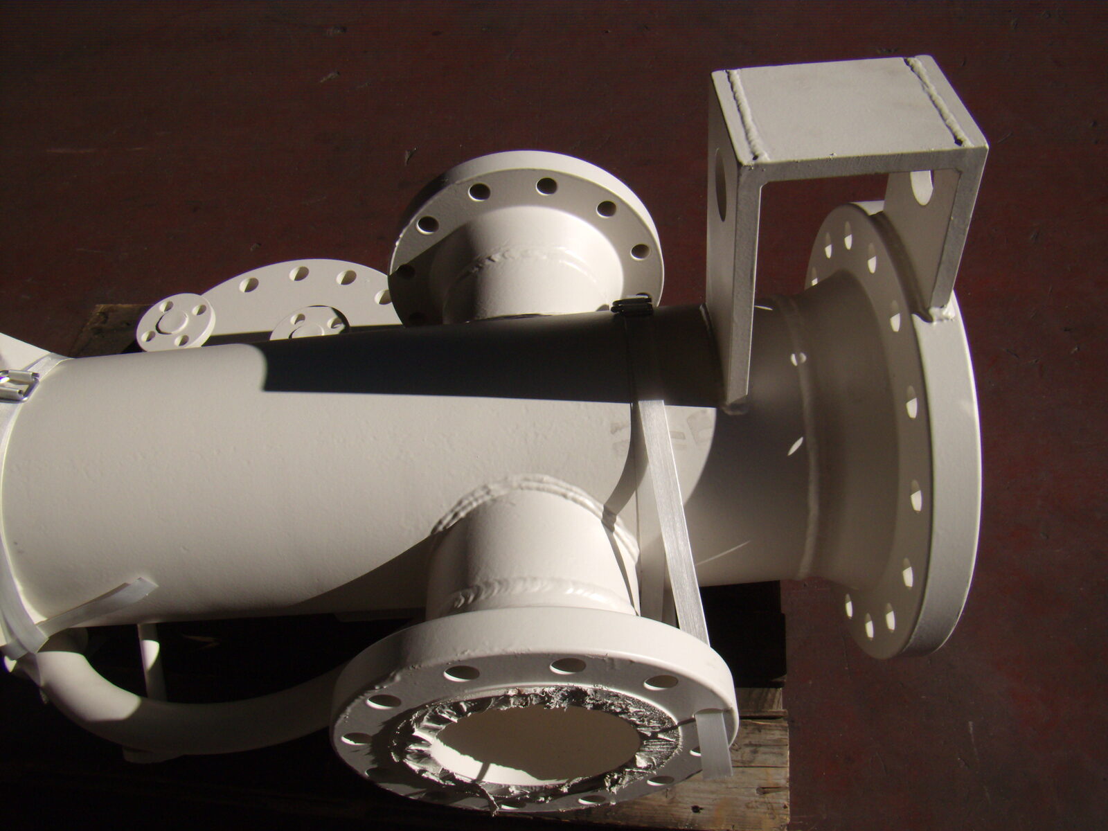 Flanged manifold painted white