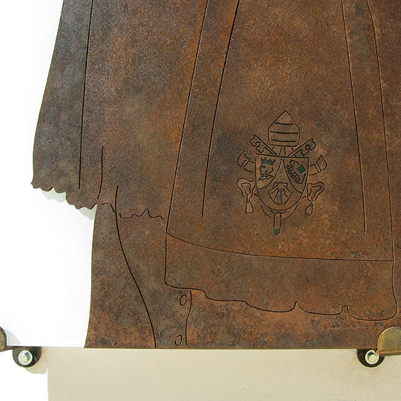 Figure engraved on rusted sheet