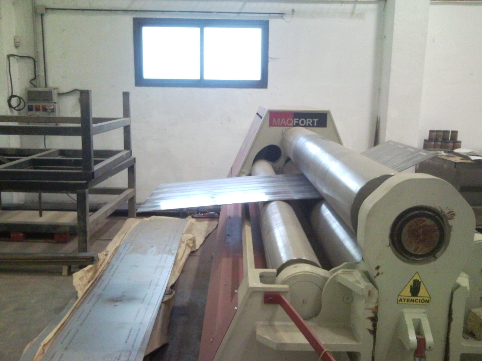 Curved plate on rolling machine