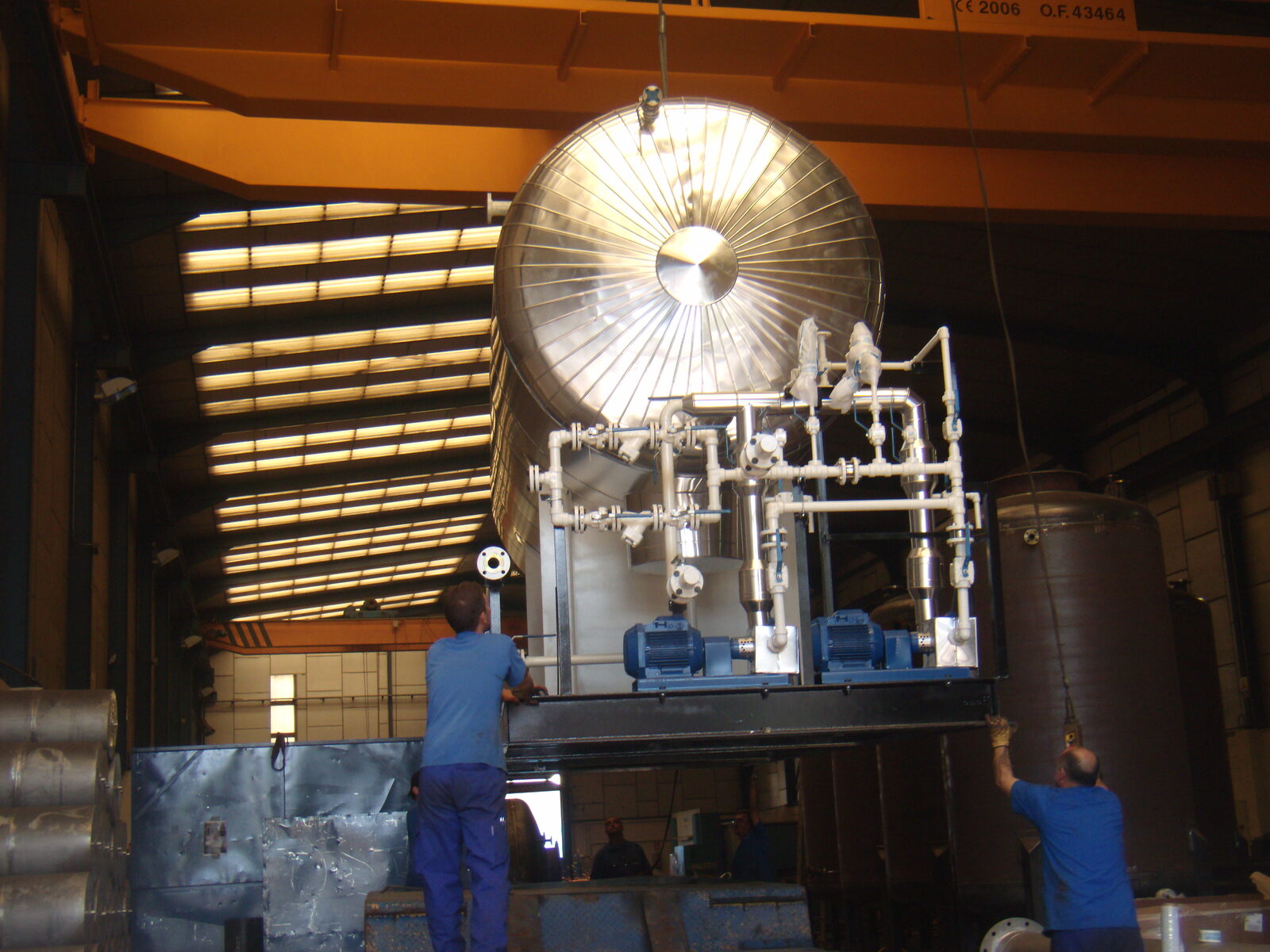 Insulated tank being lifted