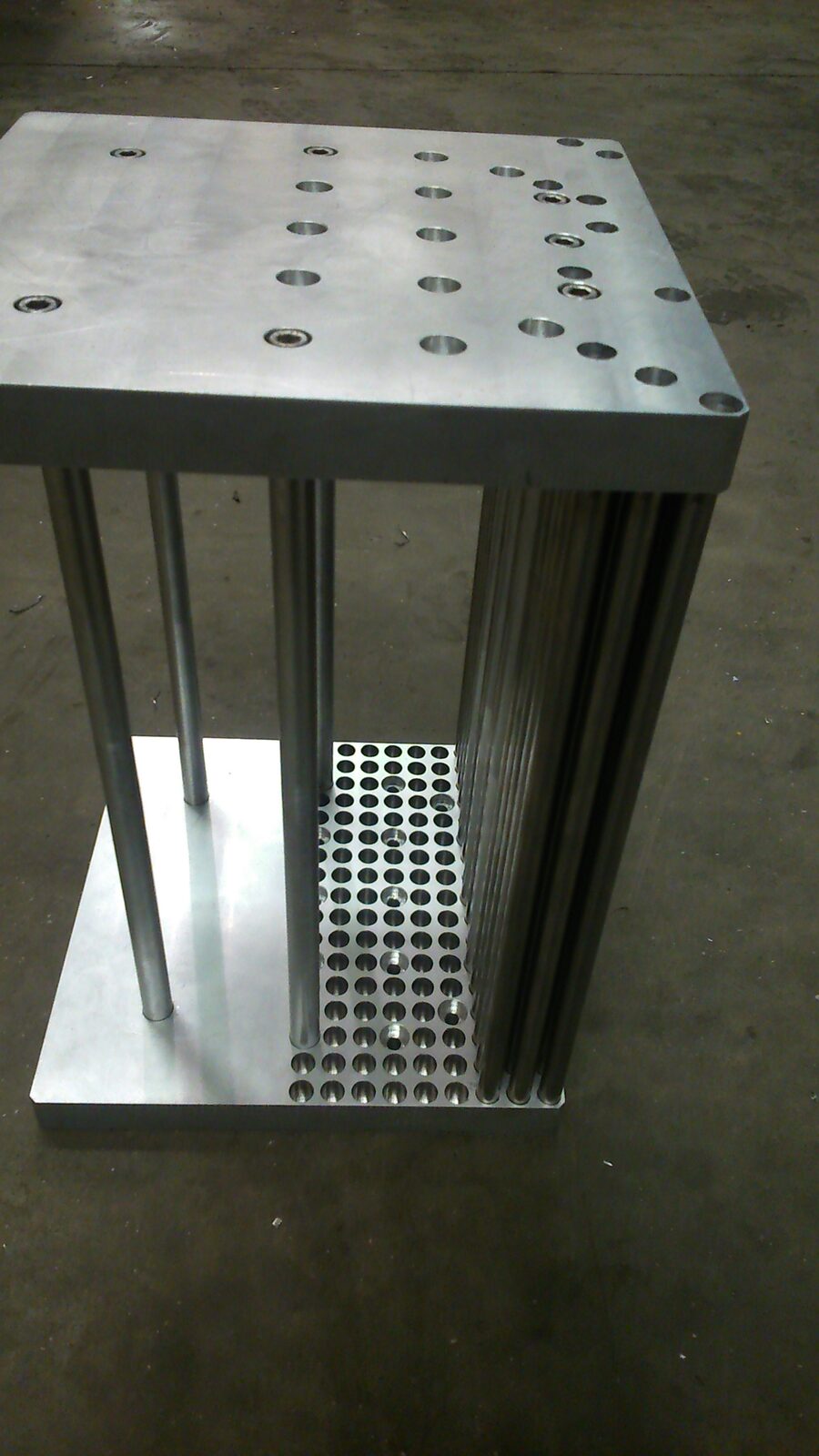Frame of drilled plates