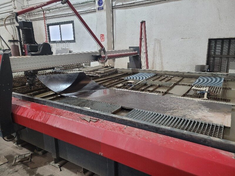 Sheet on waterjet cutting table