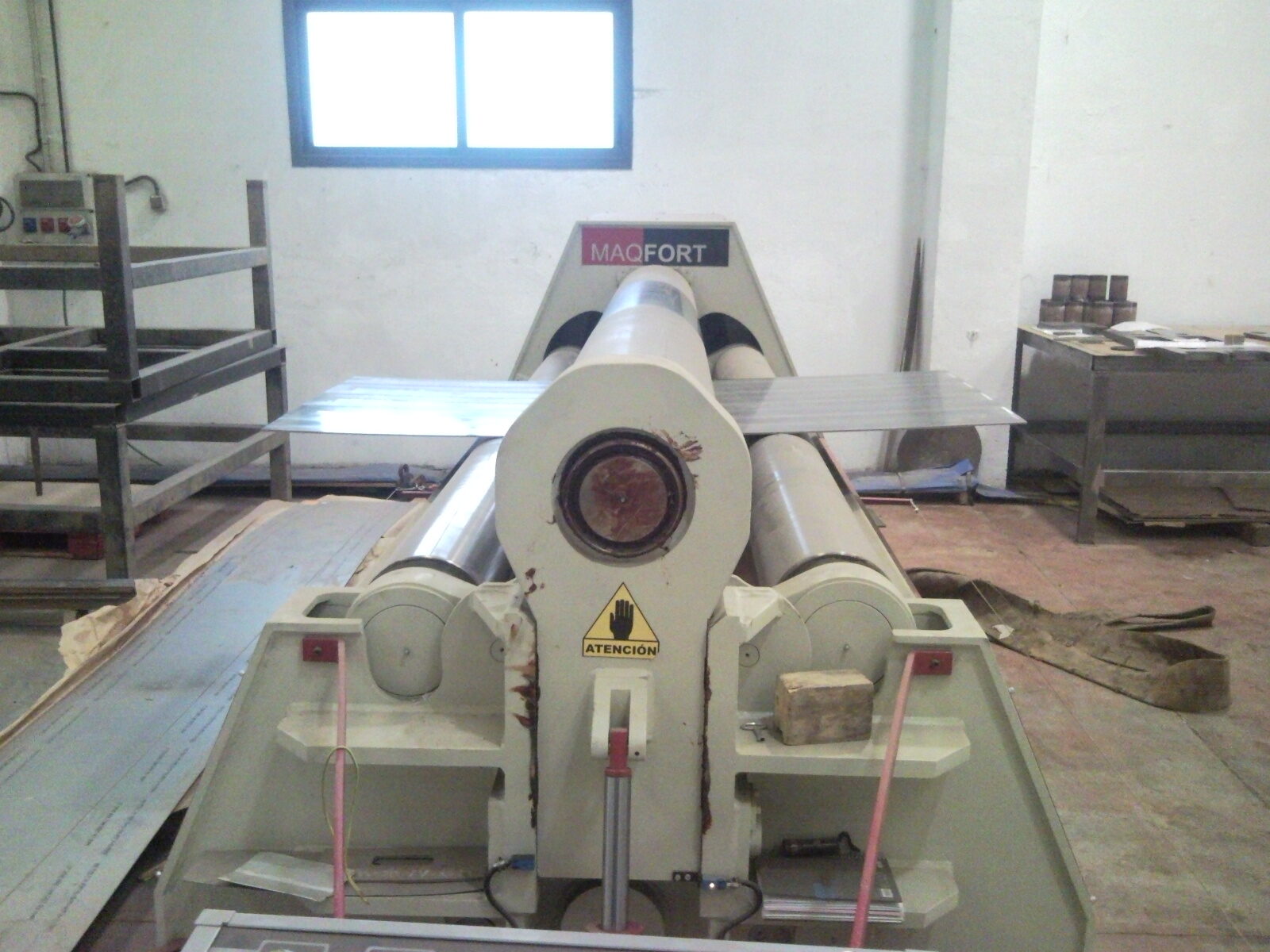 Plate rolling machine in operation